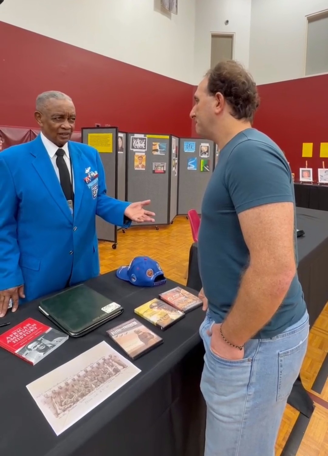 Erik speaking with Tuskeegee Airmen veterans at Brooks DeBartolo Collegiate Hight School.
